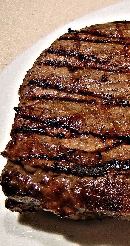 OVEN-ROASTED RIB-EYE STEAK WITH PORCINI AND PORT BUTTER